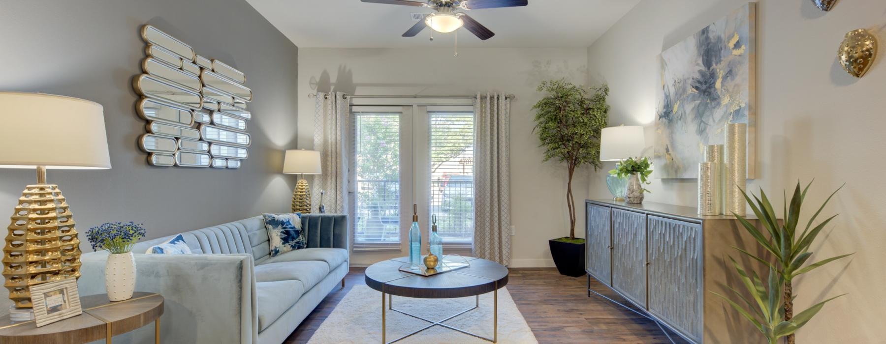 a living room with a couch and a table