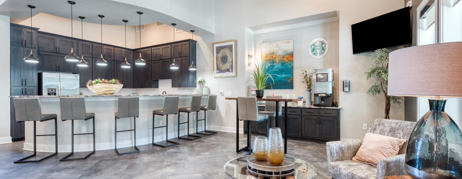 a large living room with a large island and a dining table